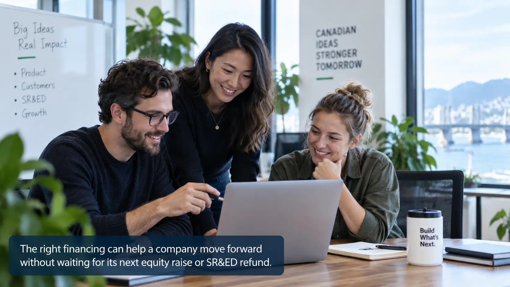 Three technology startup founders collaborating around a laptop, illustrating how SR&ED financing can support business growth without waiting for a tax refund or equity raise.